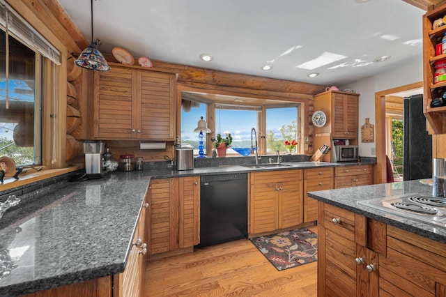 30047 Sunny Beach Rd, Grand Rapids, MN 55744 - kitchen with appliances with stainless steel finishes, a sink, light wood finished floors, recessed lighting, and brown cabinetry