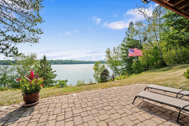 30047 Sunny Beach Rd, Grand Rapids, MN 55744 - view of patio / terrace featuring a water view