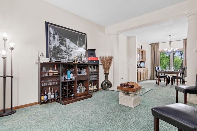 14217 Footbridge Way, Apple Valley, MN 55124 - carpeted living room with ornate columns and a chandelier