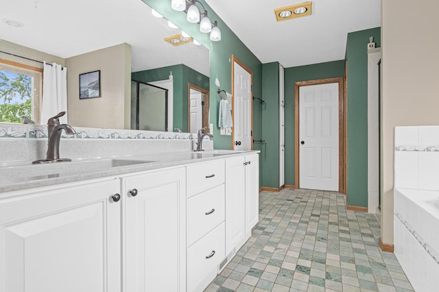 14217 Footbridge Way, Apple Valley, MN 55124 - full bathroom featuring double vanity, a stall shower, and a bath