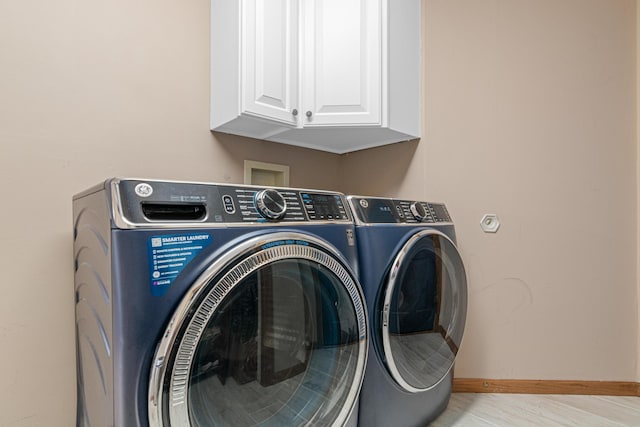 14217 Footbridge Way, Apple Valley, MN 55124 - washroom with independent washer and dryer and cabinet space