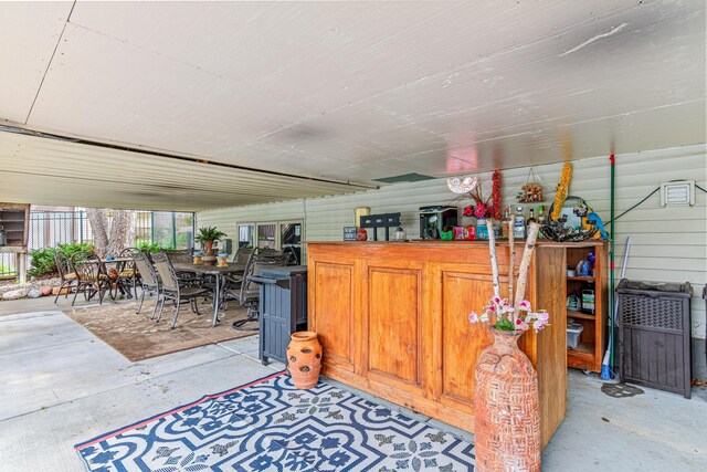 14217 Footbridge Way, Apple Valley, MN 55124 - bar area featuring concrete floors
