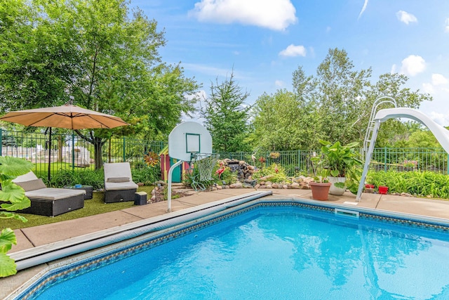 14217 Footbridge Way, Apple Valley, MN 55124 - view of swimming pool with a fenced backyard and a water slide