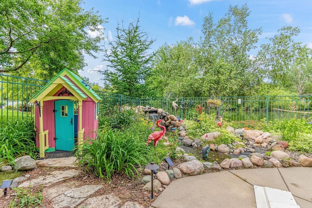 14217 Footbridge Way, Apple Valley, MN 55124 - fenced backyard with a storage unit