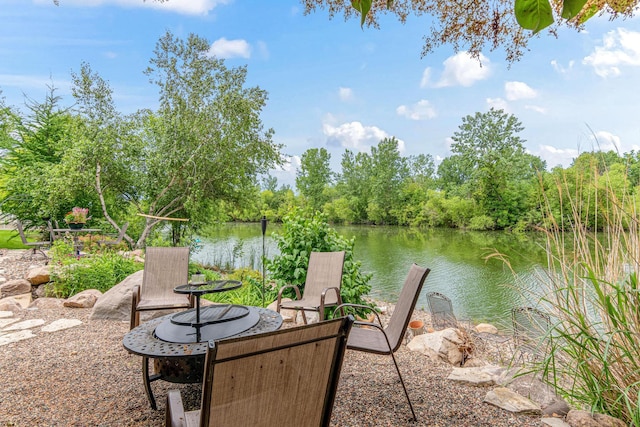14217 Footbridge Way, Apple Valley, MN 55124 - view of patio featuring a water view and an outdoor fire pit