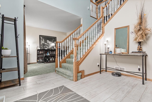 14217 Footbridge Way, Apple Valley, MN 55124 - foyer entrance featuring wood finished floors and stairs