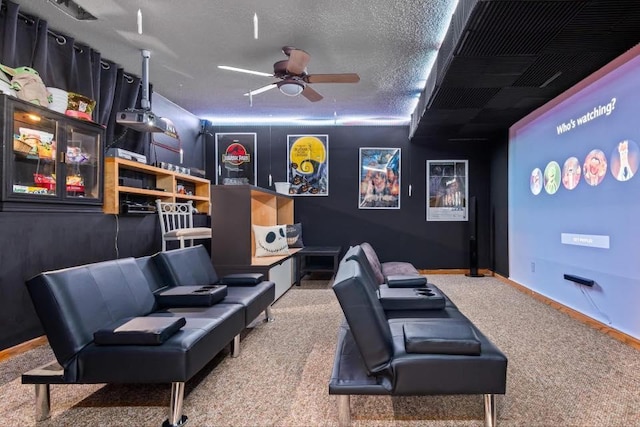 14217 Footbridge Way, Apple Valley, MN 55124 - carpeted home theater room with ceiling fan and baseboards