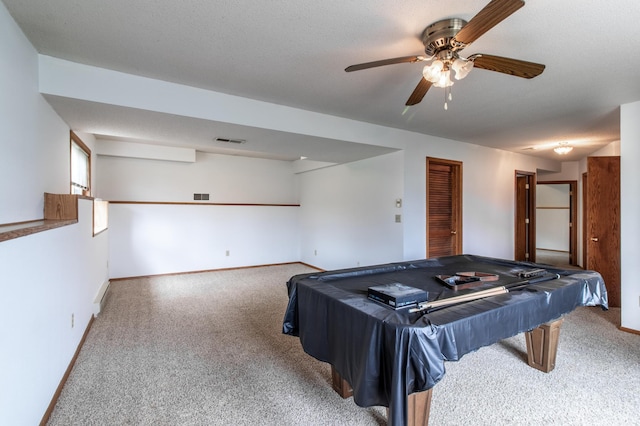 playroom with carpet floors, baseboards, a ceiling fan, and visible vents