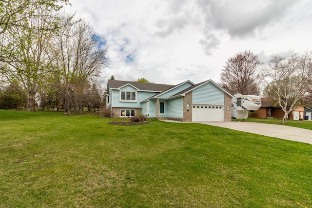 view of front of house with an attached garage, a front lawn, brick siding, a chimney, and concrete driveway