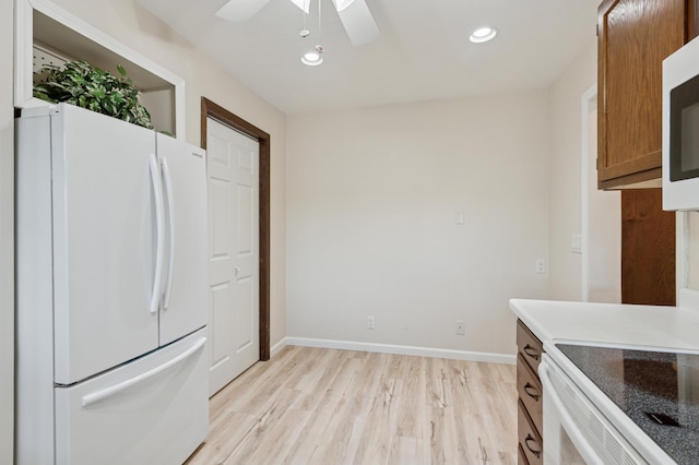 9600 Portland Ave S Unit 322, Bloomington, MN 55420 - kitchen featuring white appliances, recessed lighting, a ceiling fan, light wood-type flooring, and baseboards