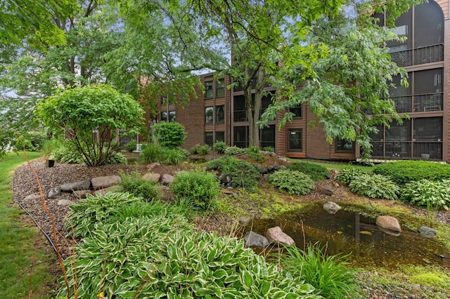 9600 Portland Ave S Unit 322, Bloomington, MN 55420 - surrounding community with a garden pond