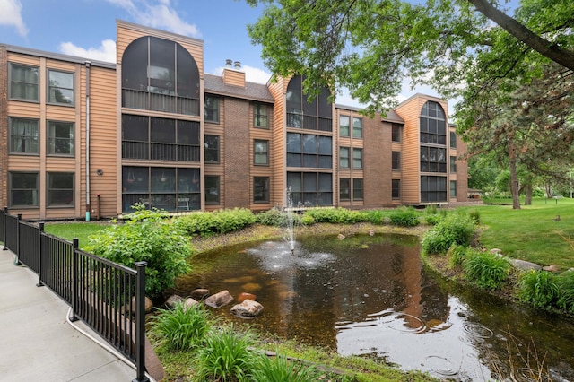 9600 Portland Ave S Unit 322, Bloomington, MN 55420 - view of property with a small pond
