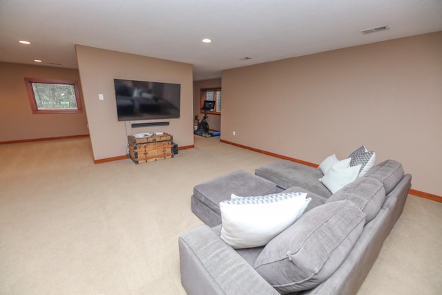 living area with baseboards, carpet, recessed lighting, and visible vents