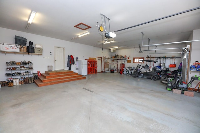 garage with freestanding refrigerator