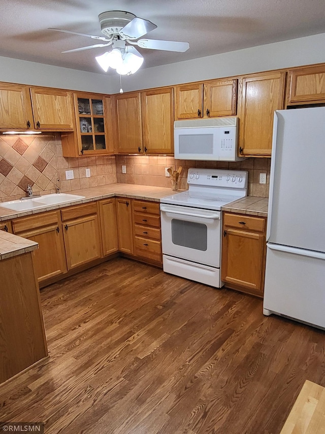 17275 Marshfield Ln SE, Prior Lake, MN 55372 - kitchen featuring white appliances, a sink, tile countertops, and tasteful backsplash