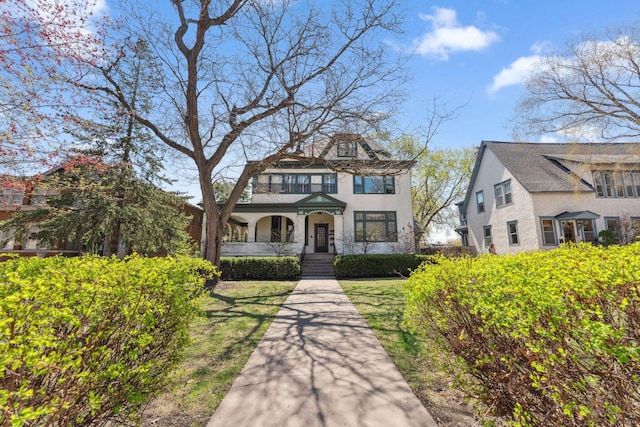 710 Summit Ave Unit 4, Saint Paul, MN 55105 - victorian house featuring stucco siding and covered porch