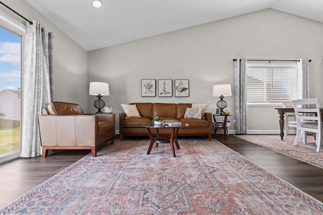 living area with recessed lighting, baseboards, vaulted ceiling, and wood finished floors