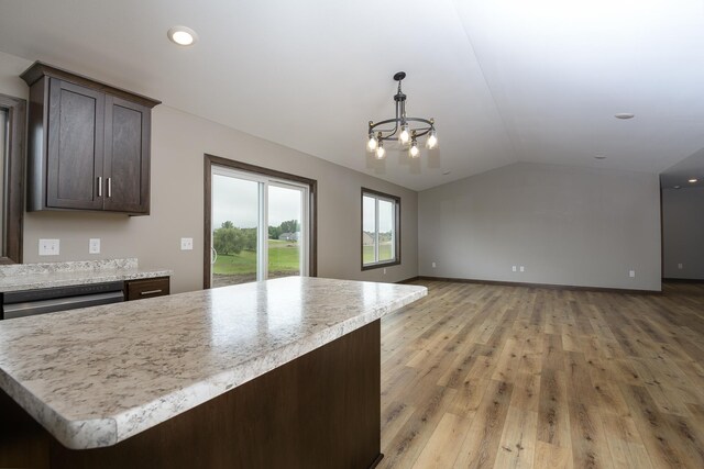 LOT4 Wilderness Ridge Rd SE, Alexandria Twp, MN 56308 - kitchen featuring light countertops, open floor plan, and vaulted ceiling