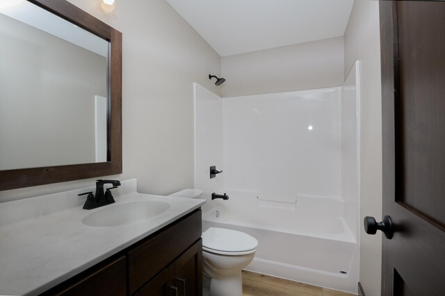 LOT4 Wilderness Ridge Rd SE, Alexandria Twp, MN 56308 - bathroom featuring vanity, toilet, wood finished floors, and tub / shower combination
