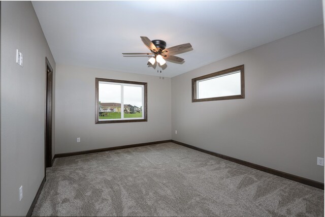 LOT4 Wilderness Ridge Rd SE, Alexandria Twp, MN 56308 - unfurnished room with carpet floors, baseboards, and ceiling fan