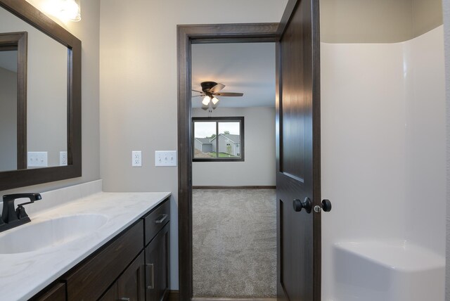 LOT4 Wilderness Ridge Rd SE, Alexandria Twp, MN 56308 - bathroom with ceiling fan, baseboards, and vanity