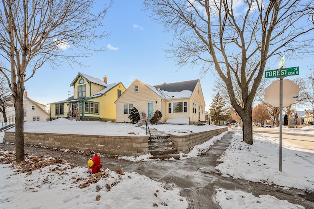 view of front of property featuring a chimney