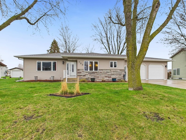single story home with an attached garage, a front lawn, stone siding, and concrete driveway