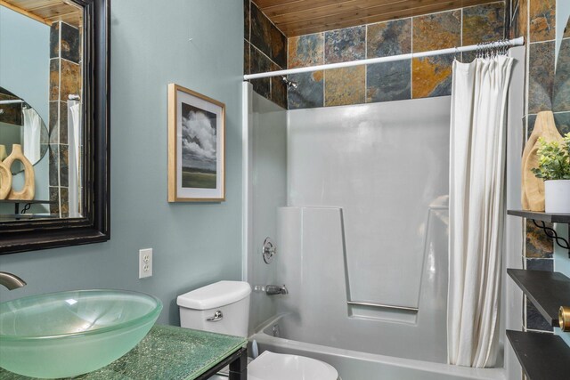 bathroom with shower / bath combo, toilet, vanity, and wooden ceiling