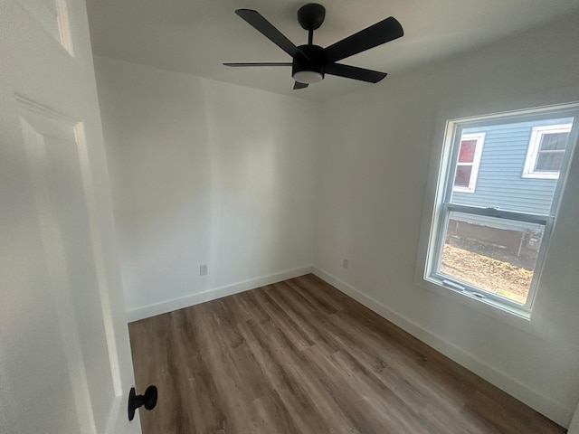 507 Peck St, Fergus Falls, MN 56537 - unfurnished room with wood finished floors, ceiling fan, and baseboards
