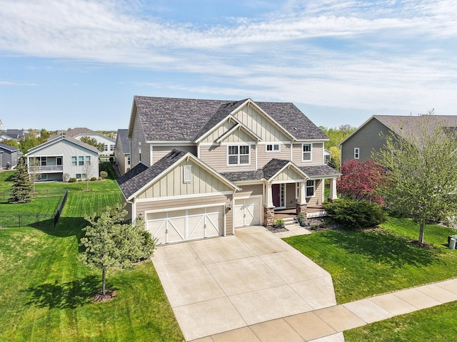 craftsman house featuring board and batten siding, concrete driveway, covered porch, and roof with shingles