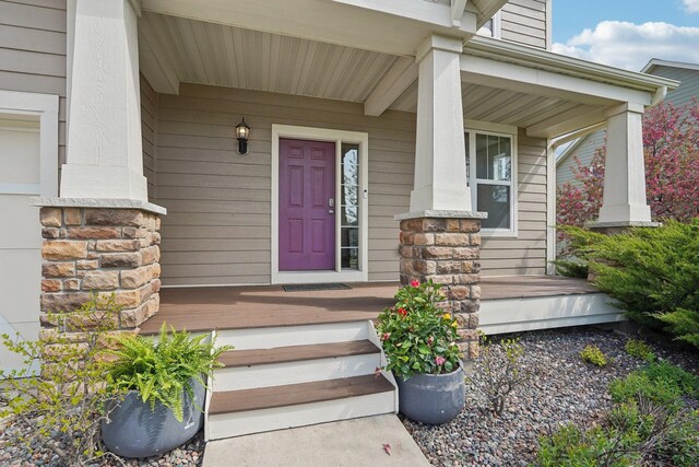 entrance to property with a porch