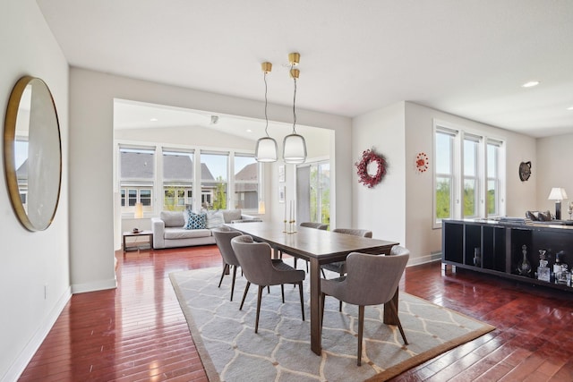 dining area featuring hardwood / wood-style floors, healthy amount of natural light, baseboards, and recessed lighting