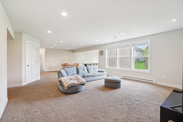 carpeted living area featuring a baseboard heating unit, recessed lighting, and baseboards
