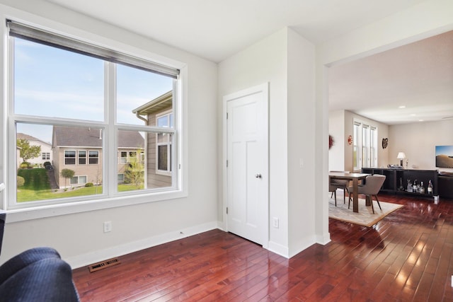 18032 72nd Pl N, Maple Grove, MN 55311 - sitting room featuring dark wood finished floors and baseboards