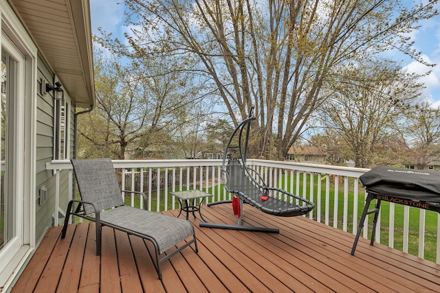 deck featuring a yard