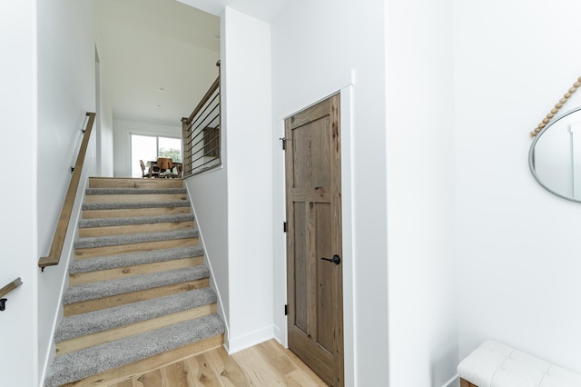 1812 Brandt Dr NE, Byron, MN 55920 - staircase featuring wood finished floors