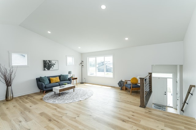 1812 Brandt Dr NE, Byron, MN 55920 - living area with lofted ceiling, light wood-style flooring, and recessed lighting