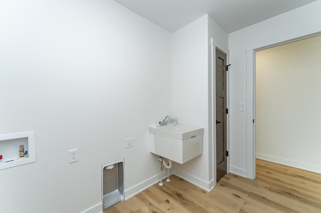 1812 Brandt Dr NE, Byron, MN 55920 - laundry room featuring light wood-type flooring, electric dryer hookup, and hookup for a washing machine