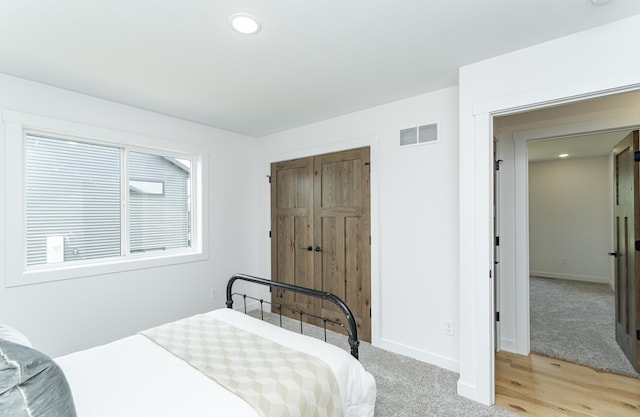 1812 Brandt Dr NE, Byron, MN 55920 - bedroom with recessed lighting and light wood-style flooring