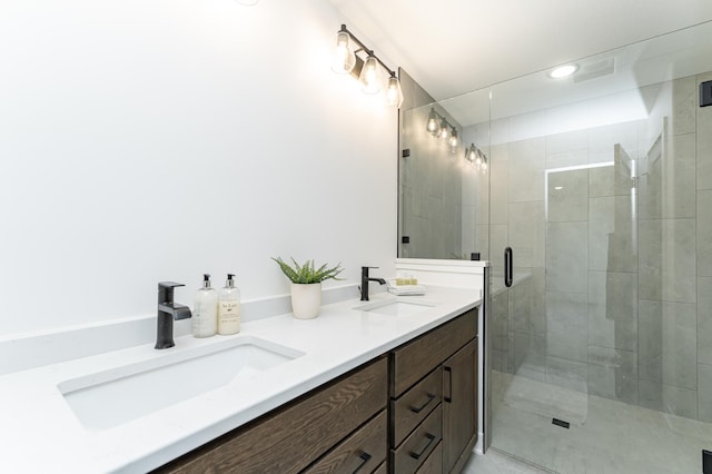 1812 Brandt Dr NE, Byron, MN 55920 - full bathroom with double vanity, a shower stall, and recessed lighting