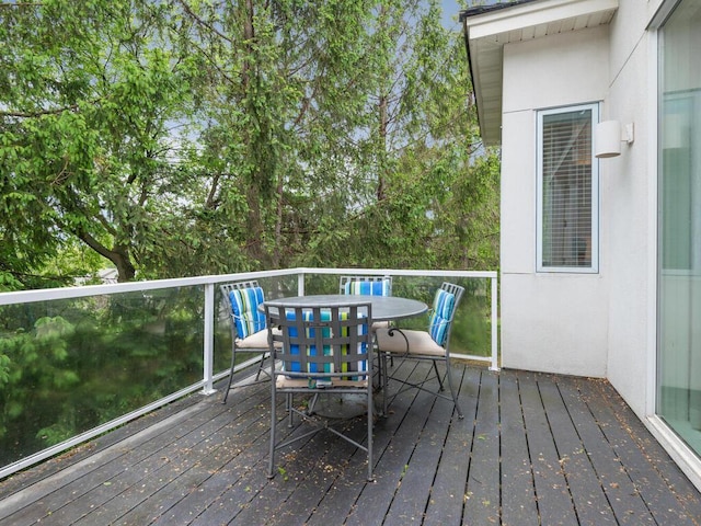 2673 Cedar Grn, Minnetonka, MN 55305 - wooden deck featuring outdoor dining space