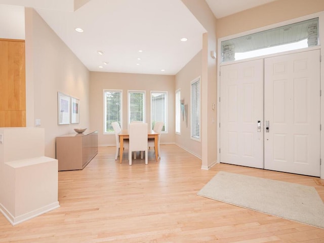 2673 Cedar Grn, Minnetonka, MN 55305 - foyer featuring light wood-style flooring, baseboards, and recessed lighting