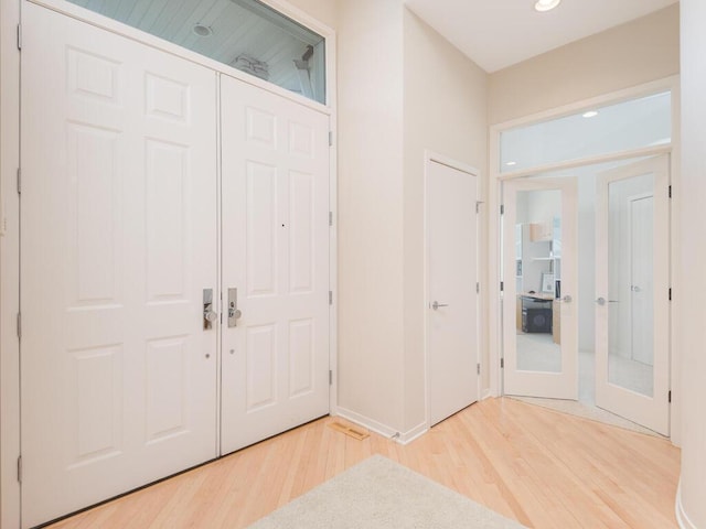 2673 Cedar Grn, Minnetonka, MN 55305 - entrance foyer featuring french doors, light wood-style flooring, recessed lighting, and baseboards