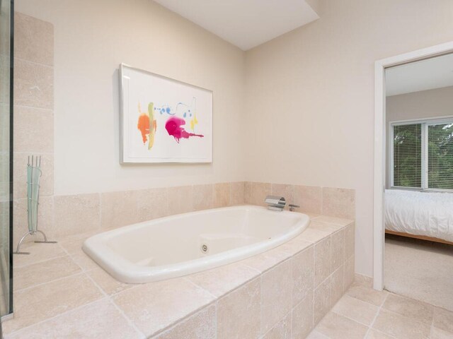 2673 Cedar Grn, Minnetonka, MN 55305 - ensuite bathroom featuring a jetted tub and tile patterned flooring