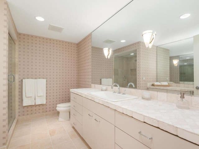 2673 Cedar Grn, Minnetonka, MN 55305 - bathroom with a stall shower, tile patterned flooring, wallpapered walls, toilet, and vanity