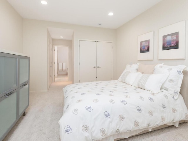 2673 Cedar Grn, Minnetonka, MN 55305 - bedroom with light colored carpet, a closet, recessed lighting, and baseboards