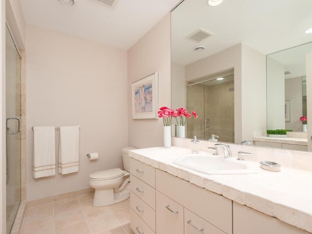 2673 Cedar Grn, Minnetonka, MN 55305 - full bath featuring a stall shower, toilet, tile patterned floors, and vanity