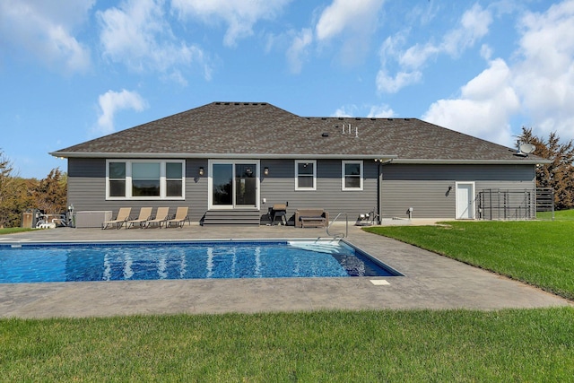 8619 State Highway 55 NW, Annandale, MN 55302 - back of property with a yard, a patio area, and an outdoor pool
