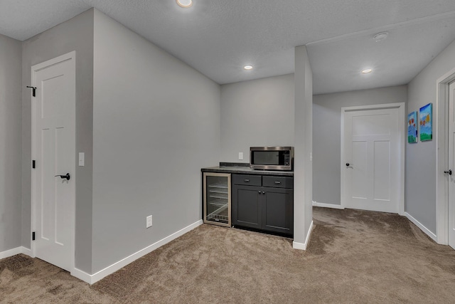 8619 State Highway 55 NW, Annandale, MN 55302 - bar with baseboards, carpet flooring, stainless steel microwave, and wine cooler