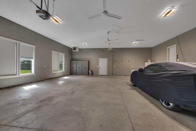 8619 State Highway 55 NW, Annandale, MN 55302 - garage with ceiling fan and a garage door opener